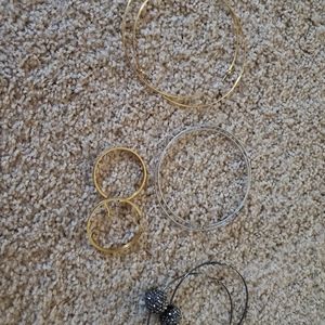 Lot of hoop earrings.